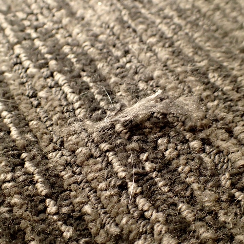 loose carpet tuft